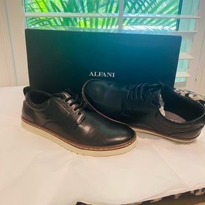 Men’s alfani dress shoe type sneaker in black.